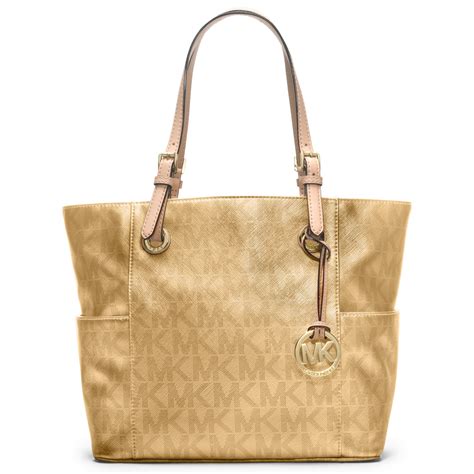 gold tone michael kors purse with mk logo on front|Michael Kors large gold tote.